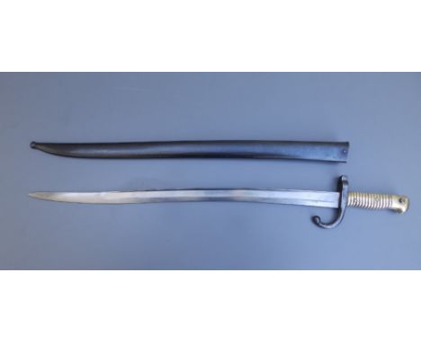 A French chassepot sword bayonet with 23" blade in scabbard, manufactured at St. Etienne, January 1872.