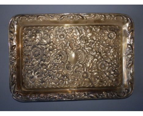An Edwardian floral embossed silver rectangular tray - JDWD, Chester 1904, 12" across.