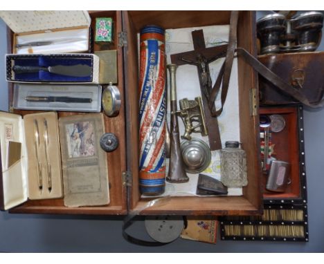 A mahogany box containing modern pens, a crucifix and other collectors' items.