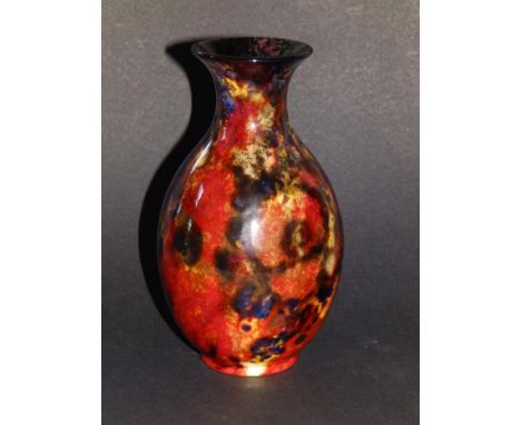 A Royal Doulton flambe vase, exhibiting a range of mottled glazes - 'MG', 6.5" high.