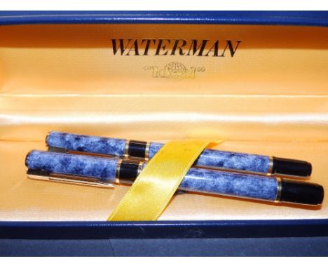 A boxed Waterman 'Ideal' pen set - fountain and ballpoint, in marbled blue. (2)