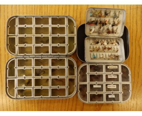 Three Wheatley fishing fly cases with contents.