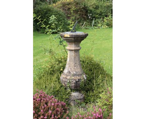 A 19th Century carved bulbous shaped octagonal pillar Sundial, with slate and steel dial on top, approx. 132cms (52") overall