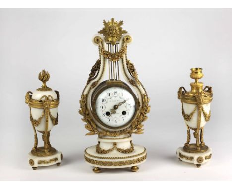 A quality ormolu and white marble Clock Garniture, the lyre shaped body draped in floral garlands, the enamel dial hand paint