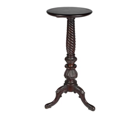 A fine quality 19th Century mahogany tripod Stand, the plain circular top with rope turned pillar on carved out splayed cabri