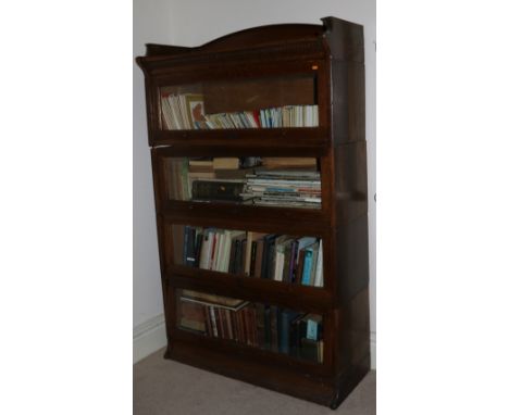 A Globe Wernick "The Lebus" Stacking oak Bookcase, with sliding glazed doors. (1)