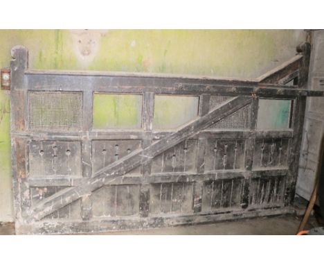 A fine large iron bound Wooden Entrance Gate, in the Tudor style, approx. 120" long. (1)