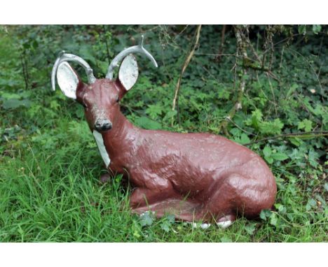 A composition and painted Model of a resting Deer. (1)