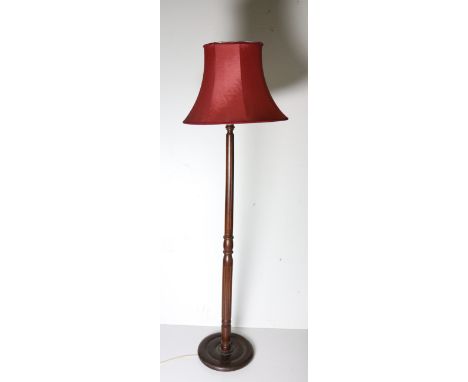 A wooden Lamp Standard, with maroon shade, a small wooden Table Lamp with cream shade, an oval painted Lamp; and one other La