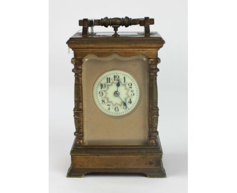 A late 19th Century ormolu Repeater Carriage Clock, by R. &amp; Co., Paris, the hinged and shaped carrying handle over a beve