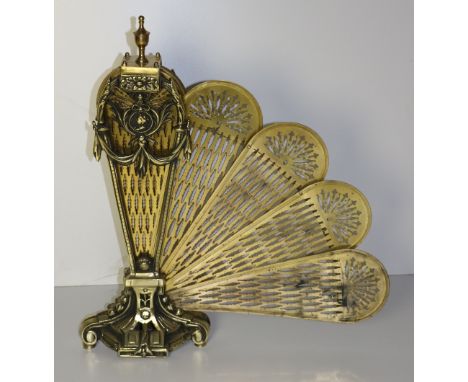 An attractive heavy brass Peacock Fan Firescreen. (1)
