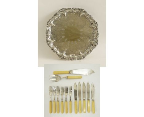A British silver plated round salver in the Chippendale style, standing on four floral feet, W43cm, together with an English 
