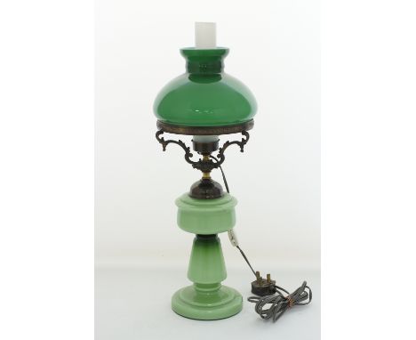 A Bohemian green opaline oil lamp converted to electricity, H57cm, early 20th century.