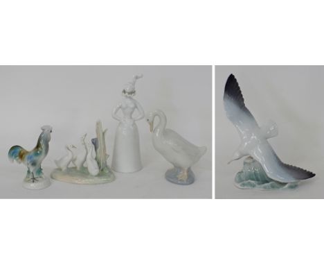 A collection of porcelain ornaments comprising of a Rosenthal porcelain figurine of a seagull flying over the waves W21cm, H2