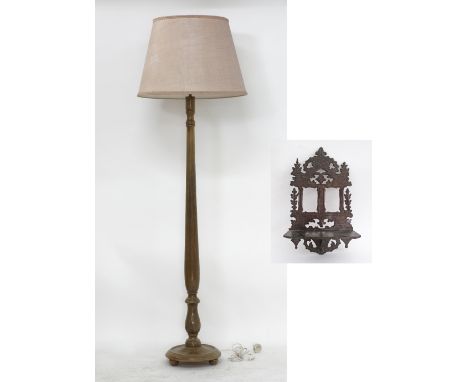 A floor lamp on turned wooden column with a pink shade. H187cm, W60cm, together with a Cypriot carved pinewood folding wall h