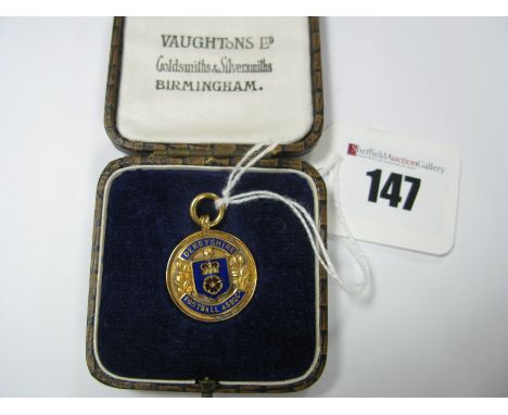 Medal, Derbyshire Football Association. Medal compt winners 1934-5, by Vaughton and Sons in 9ct gold and enamel. Bearing hall