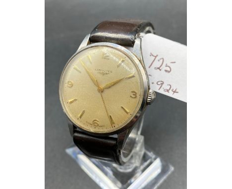 A Longines wrist watch with seconds sweep