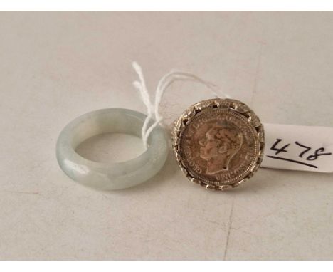 A silver ring and a jade ring