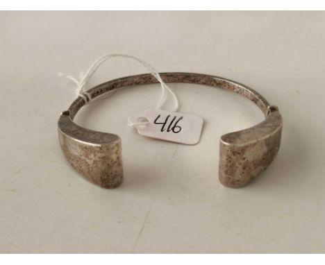 A designer silver torque bangle, 18 g