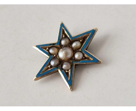 A antique star shaped pin with pearls and enamel, 18ct