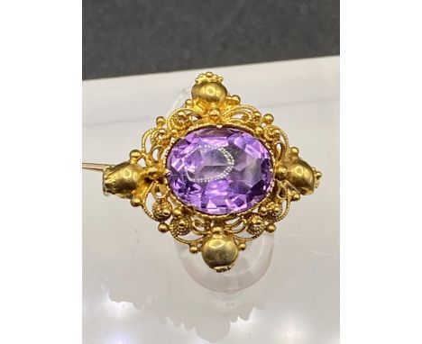 An early Victorian fancy designed amethyst brooch, 15ct