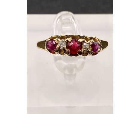 A ruby and diamond ring 18ct gold size P 2.3 gms