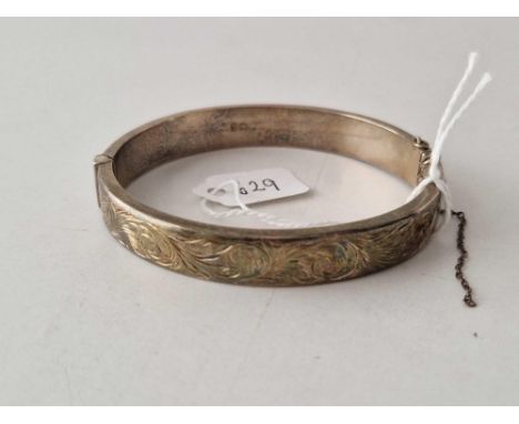 A silver hinged bangle Chester 1961 18 gms