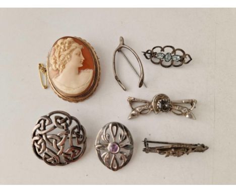Seven antique and vintage silver brooches