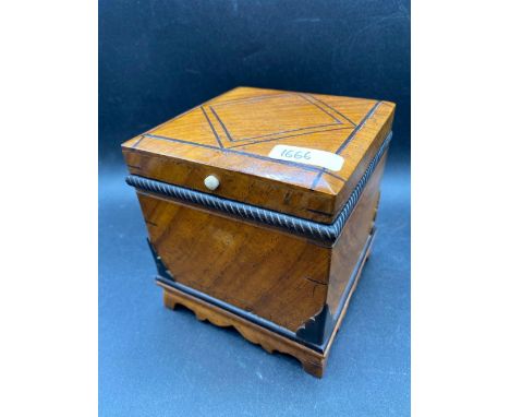 An inlaid satin wood caddy, 5 inches square