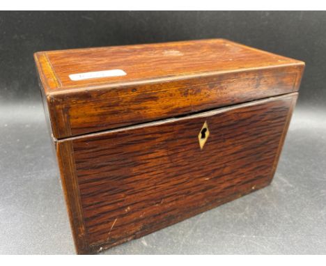 A partridge wood tea caddy with inlaid band