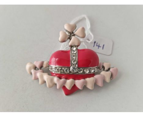 A Vivian Westwood stone set and enamel brooch