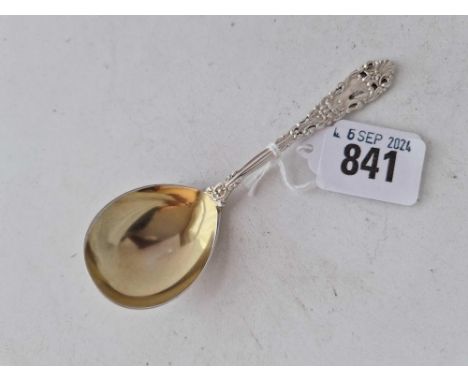 A sterling silver caddy spoon, pierced stem, gilt bowl
