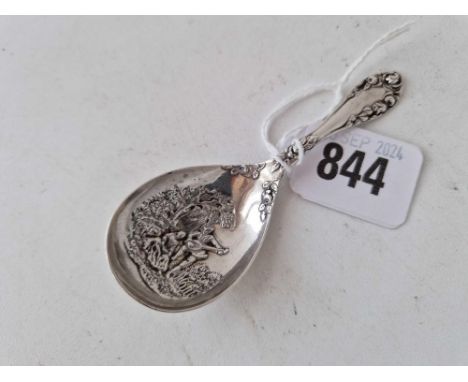 A decorative caddy spoon with embossed romantic bowl, Birmingham 1903 by L&amp;S