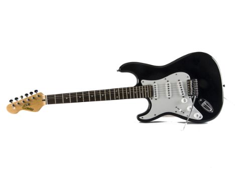 Guitar & Amp, left handed 'Encore' electric guitar (black & white) good condition together with a small Guitar Amplifier B.B.