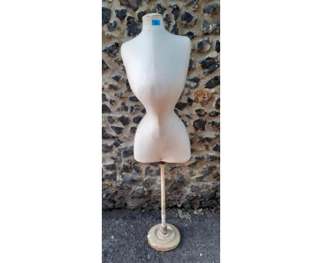 An early 20th Century French Stockman Paris 5055 mannequin/dressmaker's dummy on an adjustable treen stand. Location:BWR 