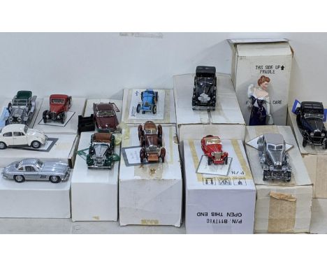 Twelve Franklin Mint diecast precision model vehicles to include the 1930s Bugatti Royale Coupe Napoleon and others, together