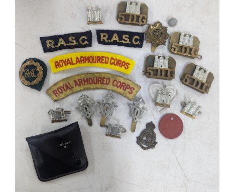 Military interest - 5th Royal Inniskilling Dragoon Guards cap badges, shoulder tiles and other items to include a dog tag, Ro