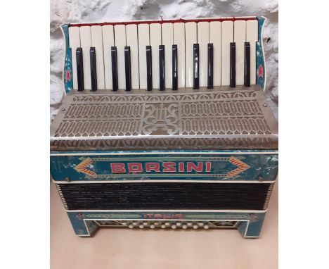 An Italian Borsini accordion, 16 buttons with turquoise pearlised decoration together with a travel case. Location:A1B 