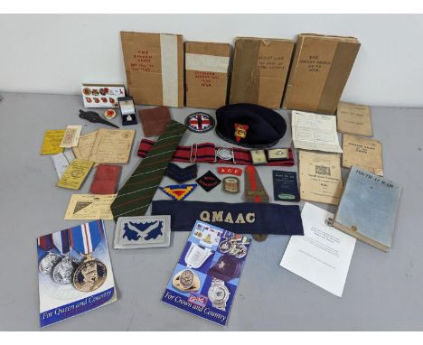 A mixed lot of military interest to include Royal Berkshire Regiment beret, cap badge and cloth badge along with other badges