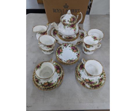 A Royal Albert Old Country Roses pattern, six place teaset with a teapot, sugar bowl and cream jug 