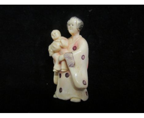 Ivory netsuke model of a oriental lady 