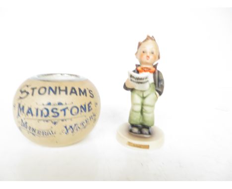 Advertising match holder together with a goebel figure 