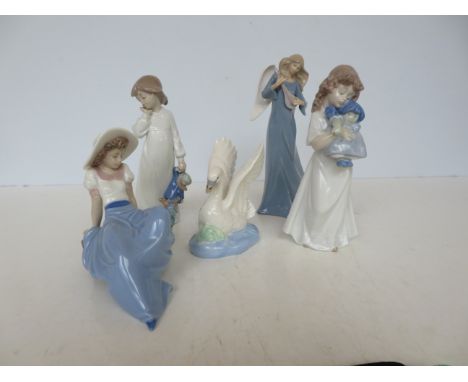 3 Nao figures together with 2 others 