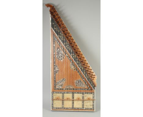A FINE TURKISH MOTHER OF PEARL AND BONE INLAID QANUN; musical string instrument with fitted carrying case, 91.5cm x 38cm.
