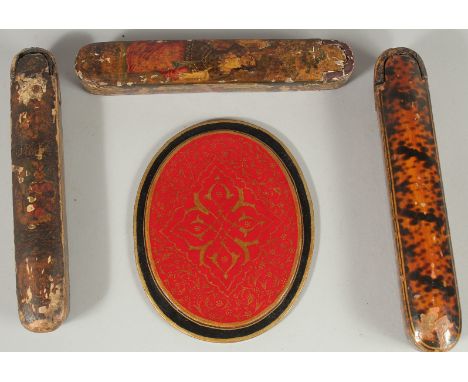 THREE PERSIAN QAJAR LACQUERED QALAMDANS PEN BOXES, together with another oval panel, (4).