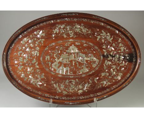 A VERY FINE CHINESE MOTHER OF PEARL INLAID HARDWOOD OVAL TRAY, beautifully decorated with central panel depicting a courtyard