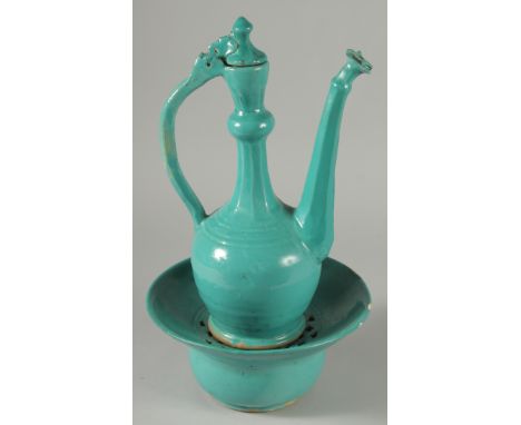 A RARE 17TH-18TH CENTURY PERSAIN SAFAVID MONOCHROME TURQUOISE GLAZED POTTERY LIDDED EWER AND BASIN, ewer 35cm high, basin 24c