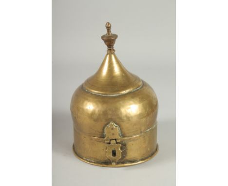A RAJASTHANI MUGHAL COPPER LIDDED CIRCUALR CADDY BOX, 19cm high, 12.5cm diameter.