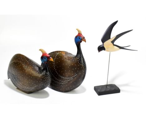 FEATHERS OF KNYSNA; two limited edition painted wood models of guinea fowl, one numbered 341/975, the other 336/975, the tall