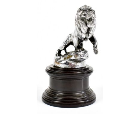 PEUGEOT; a nickle plated car mascot after a design my Morris Marx, modelled as a rampant lion on a circular base, with later 